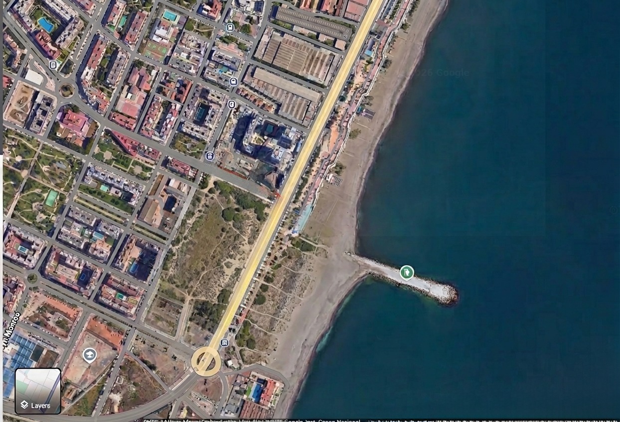 Satellite aerial view of the beachfront plot location