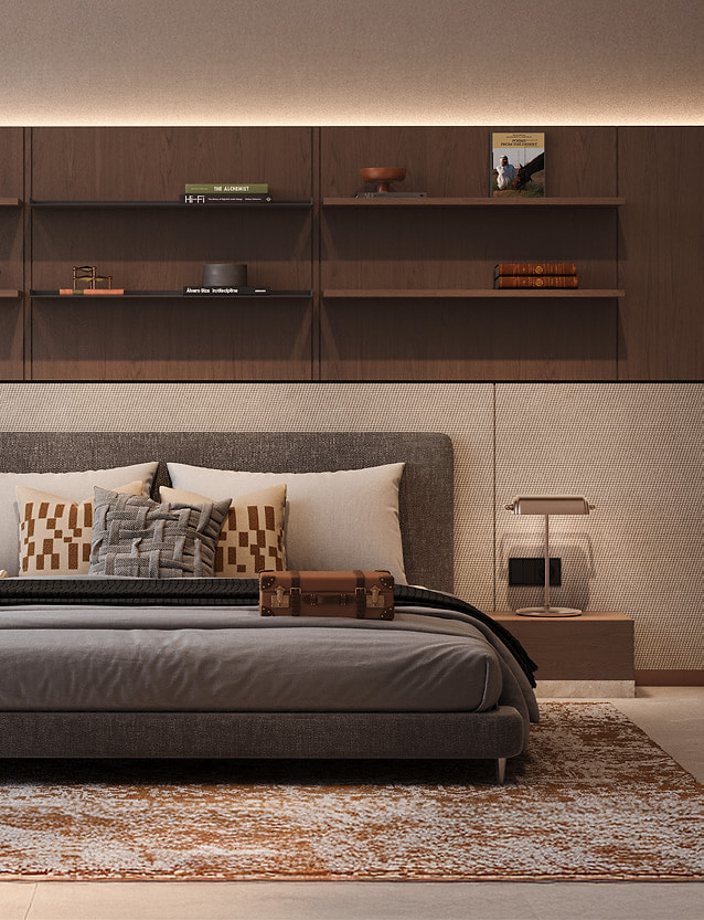 Bedroom with built-in library shelving at The Archive by Imtiaz